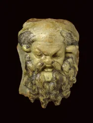 Silenus-Kopf aus glasierter Fayence